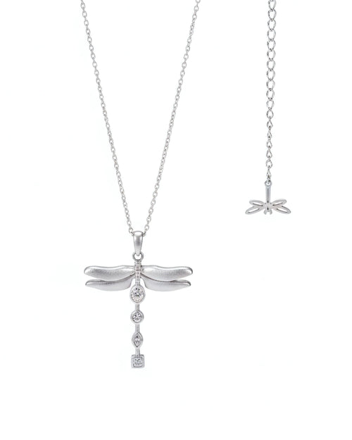 White gold dragonfly pendant necklace on a white background